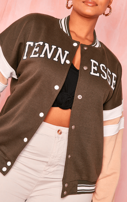 Women's Brown Varsity Bomber Leather Jacket with Pink Sleeves - Stylish and Unique