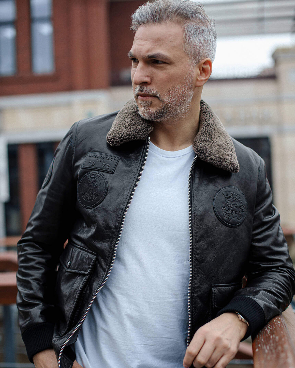 Black Fur Collar Leather Jacket with Embossed Patches